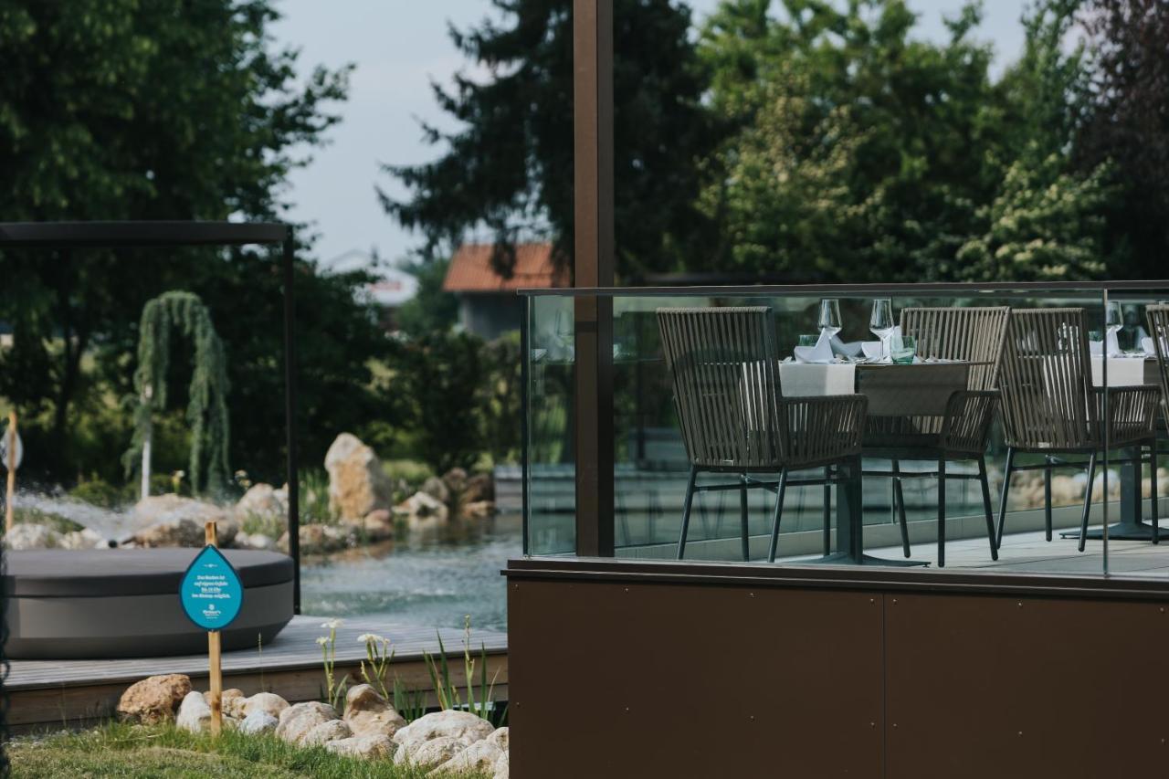 Ortner'S Resort Bad Füssing Exterior foto A glass balustrade